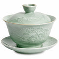 Gaiwan en porcelaine avec motifs floraux sur fond vert